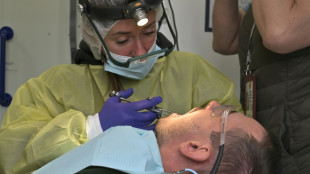 Ukraine dentists brave frontline fire to treat troops