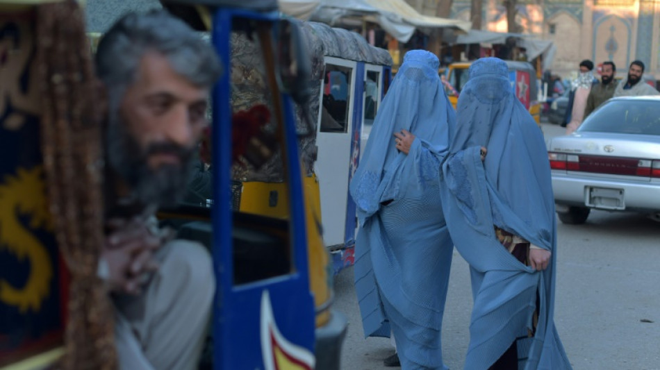 Taliban order Afghan women to wear all-covering burqa