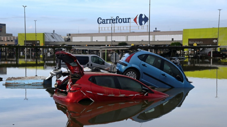 Spain flood deaths top 200, more troops join rescue