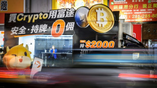 Bitcoin breaks $100,000, stocks mixed as traders eye S. Korea drama