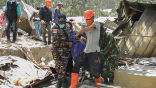 Indonesia volcano eruption kills 10, sets houses aflame