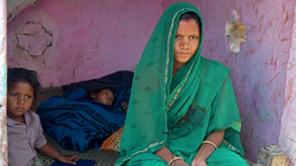 Mulheres indianas suportam a carga do crescimento demográfico