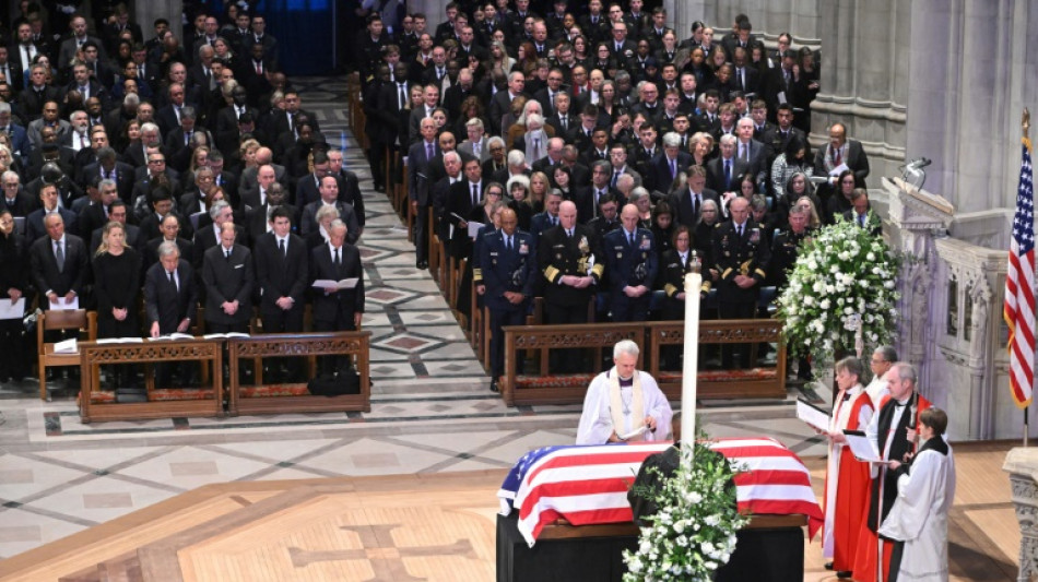 Jimmy Carter briefly unites US as presidents attend funeral