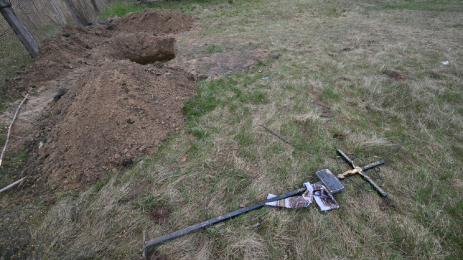 Exhumed bodies central to Ukraine probe of war 'atrocities'